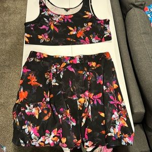 Torrid. Size 3. 2 piece crop tank top and skirt combo. Black with floral print.